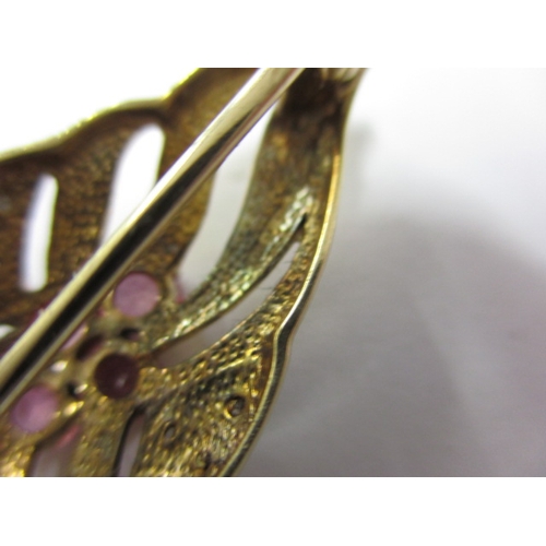 95 - A 9ct gold, diamond and ruby brooch, in useable pre-owned condition, approx. weight 3.5g