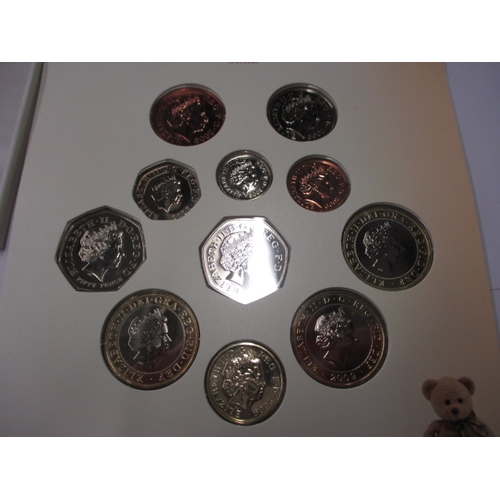 193 - A 2009 Royal Mint BU Coin set to include the Kew Gardens 50p coin, in original baby gift set present... 