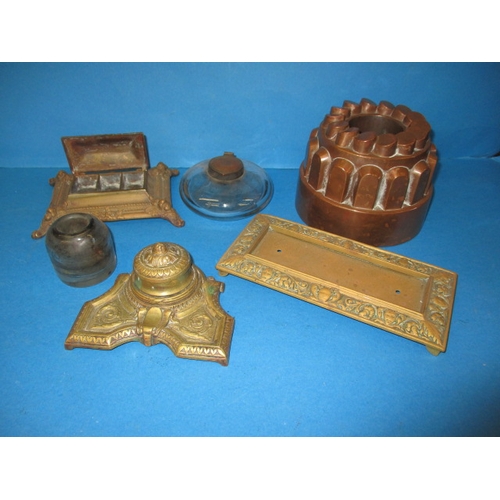 23 - A parcel of miscellanea, to include ink stands and a copper jelly mould, all in used condition