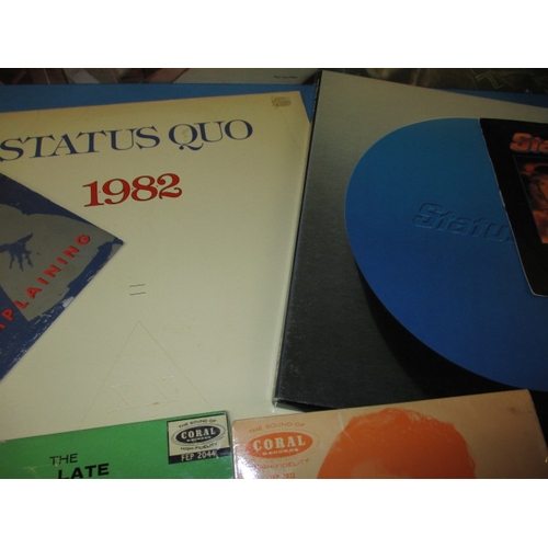 46 - A parcel of vinyl records, to include 12 and 7 inch, numerous examples by Status Quo, all in used co... 