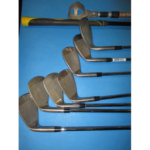 62 - A quantity of golf clubs and golf balls, all in used condition