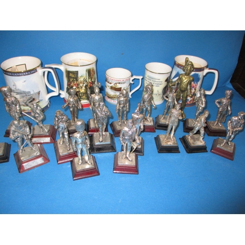 68 - A quantity of collectable die-cast military figures and military commemorative tankards, all in used... 