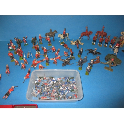 69 - A quantity of vintage die-cast model soldiers, various sizes, all in play worn condition