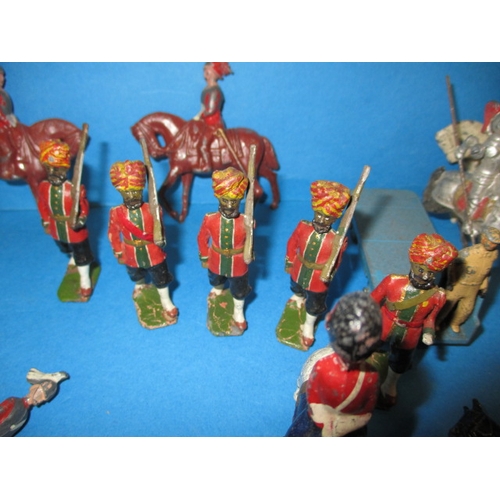 69 - A quantity of vintage die-cast model soldiers, various sizes, all in play worn condition