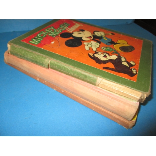 95 - A 1948 Mickey Mouse annual and two later figures and 2 other children’s annuals, all in used conditi... 