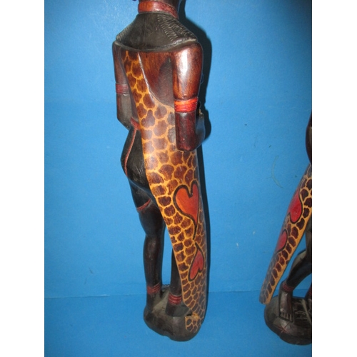 98 - Two vintage carved wood African tribal figures, well carved and retain crisp colour, approx. height ... 