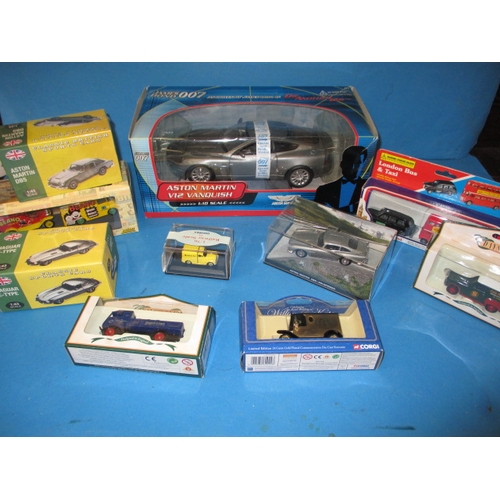 101 - A quantity of die-cast model vehicles, to include a 1:18 scale Aston Martin V12 Vanquish, all in unu... 