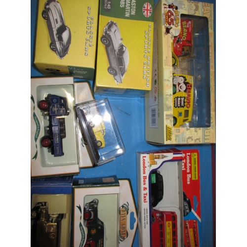 101 - A quantity of die-cast model vehicles, to include a 1:18 scale Aston Martin V12 Vanquish, all in unu... 