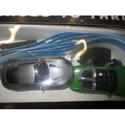 102 - A boxed 007 James Bond electric racing car set, in working order