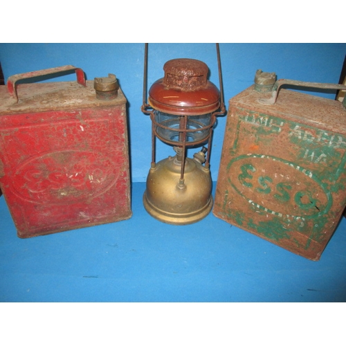 103 - Two vintage petrol cans and a Tilley storm lantern, both cans in original paint with no rust holes a... 