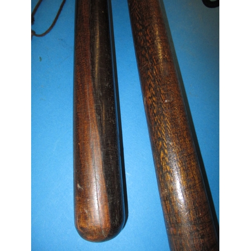 110 - Two vintage wood truncheons , approx. length of longest  49cm, in used condition