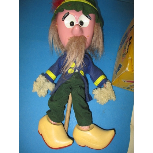 113 - A 1960s Pelham rod puppet, Mr Rusty from the magic roundabout, in original box with instruction pape... 