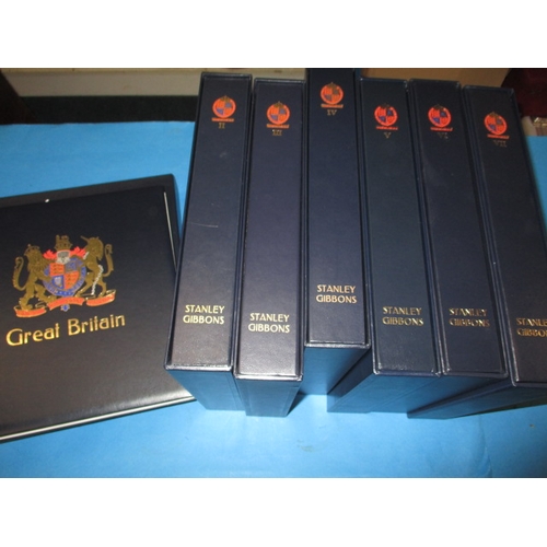 118 - 7 Stanley Gibbons stamp collecting folders, in outer sleeves, to include some stamps, all in useable... 