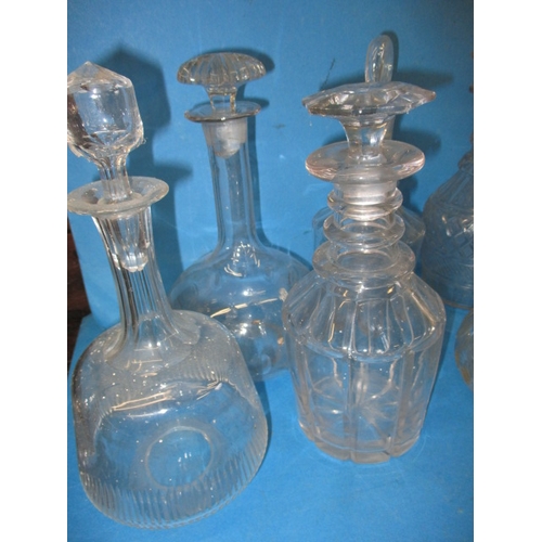 180 - A parcel of vintage glass decanters, various styles and ages, all in used condition