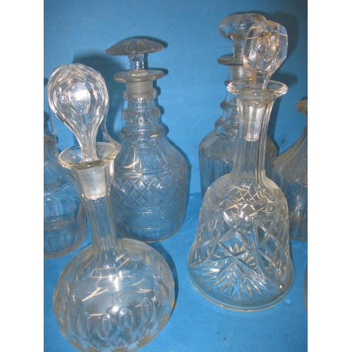 180 - A parcel of vintage glass decanters, various styles and ages, all in used condition