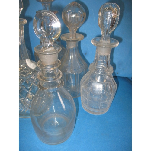 180 - A parcel of vintage glass decanters, various styles and ages, all in used condition