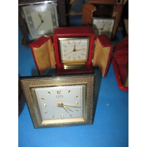 181 - A quantity of vintage travel clocks, various makers, all in used condition none tested as to functio... 