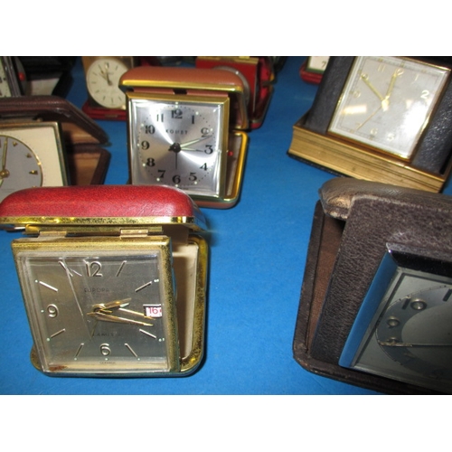 181 - A quantity of vintage travel clocks, various makers, all in used condition none tested as to functio... 