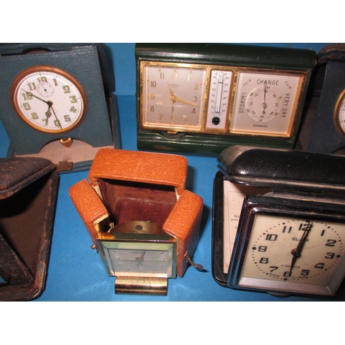 181 - A quantity of vintage travel clocks, various makers, all in used condition none tested as to functio... 