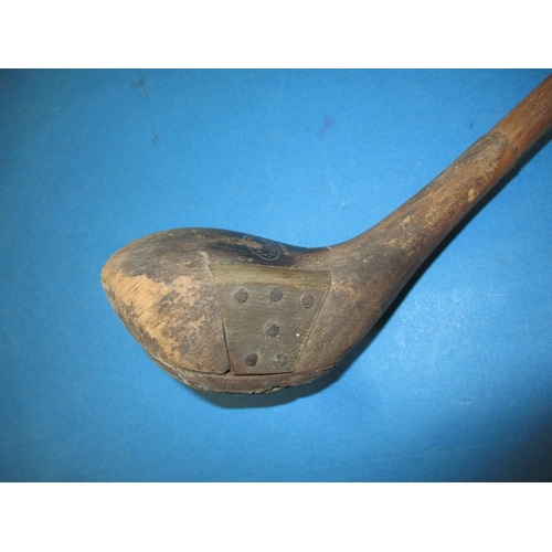 186 - An antique driver golf club, marked to head, possibly having been cut down, approx.  length 81cm