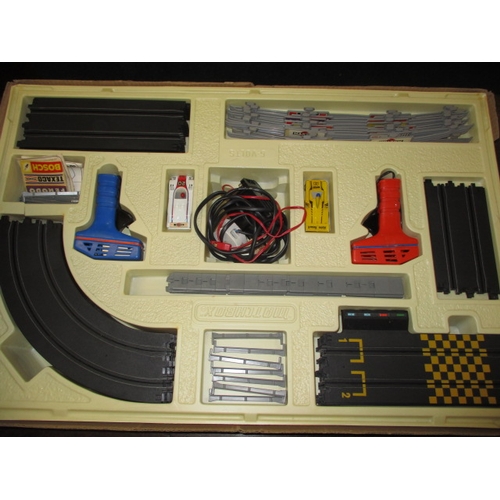 210 - A vintage Matchbox Le Mans power-track 4000 slot racing car set, in box and complete, in play worn c... 