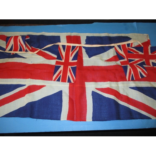 213 - A quantity of 1950s and other coronation bunting and related flags, all in used condition with some ... 