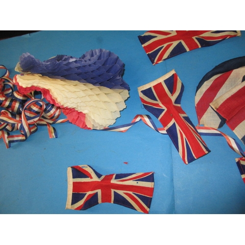 213 - A quantity of 1950s and other coronation bunting and related flags, all in used condition with some ... 