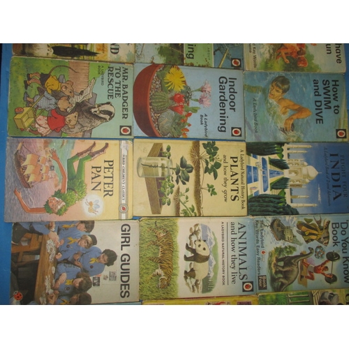 215 - A parcel of vintage Ladybird books, all in used condition, various dates