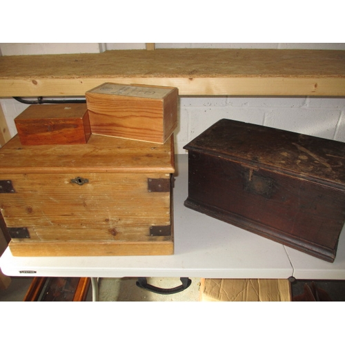 2 wooden storage boxes, one pine & one oak Approximate size of largest length 49cm, height 32cm, depth 35cm. In useable pre-owned condition