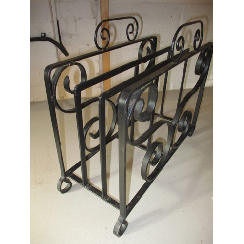 220 - A wrought iron fire screen, magazine rack and coat hook. In useable pre-owned condition