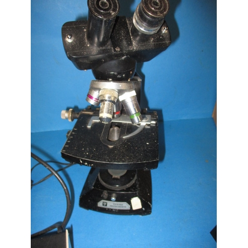 230 - Two vintage scientific microscopes, one by Vickers Instruments, both in used condition