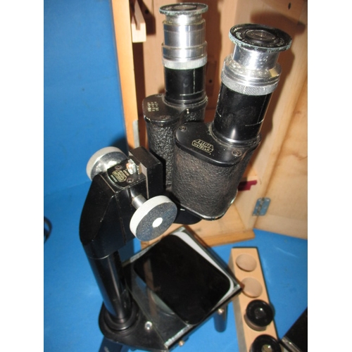 230 - Two vintage scientific microscopes, one by Vickers Instruments, both in used condition