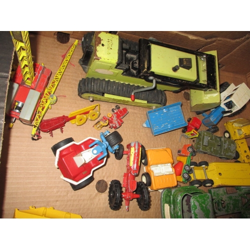 235 - A large quantity of vintage die-cast model vehicles, to include tractors and farm machines, all in p... 