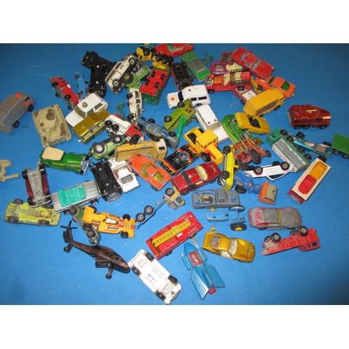 235 - A large quantity of vintage die-cast model vehicles, to include tractors and farm machines, all in p... 