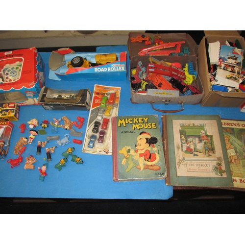 237 - A quantity of antique and later childhood toys, to include a Deans Mickey Mouse book, die-cast vehic... 