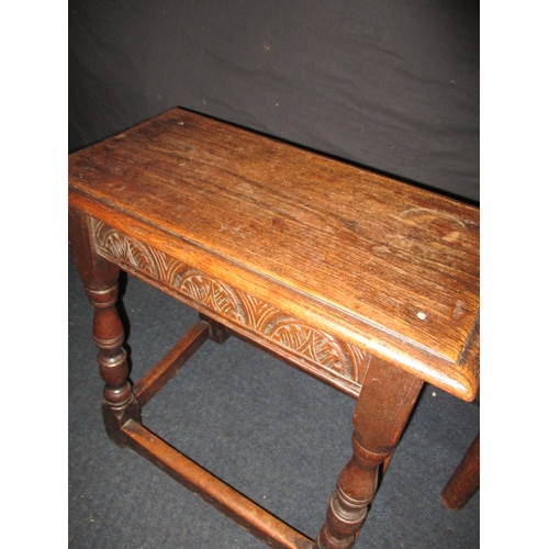 243 - A vintage brass top chess table and an oak joint stool, both in useable pre-owned condition