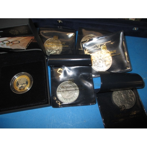 249 - A large quantity of collectors special edition coins, to include examples by the Royal Mint, all in ... 