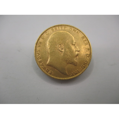 184 - An Edward VII gold sovereign dated 1910, a circulated coin with good definition of features