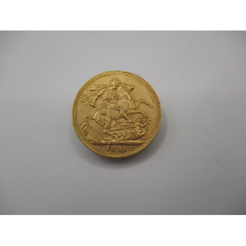 187 - A Victorian gold sovereign dated 1891, a circulated coin with good definition of features