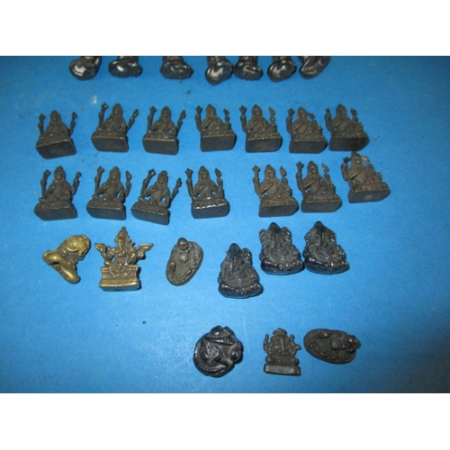 283 - A parcel of Asian cast metal figures, various sizes but approx.  26mm high, various metals, all in g... 