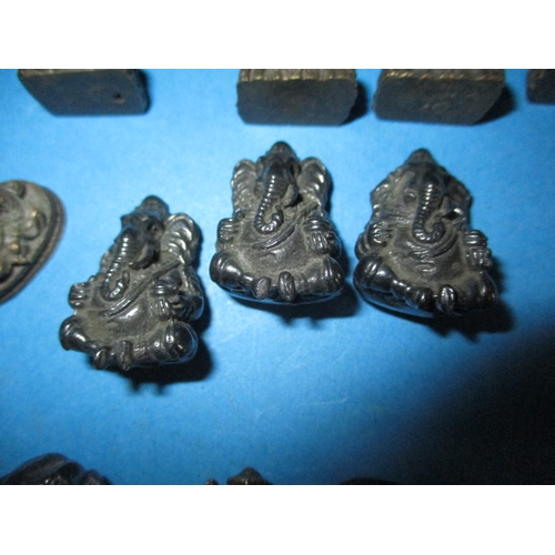 283 - A parcel of Asian cast metal figures, various sizes but approx.  26mm high, various metals, all in g... 