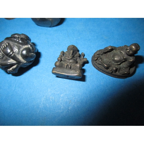 283 - A parcel of Asian cast metal figures, various sizes but approx.  26mm high, various metals, all in g... 