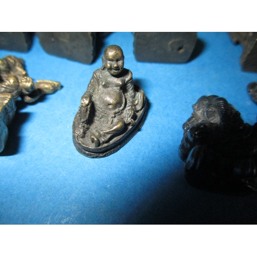 283 - A parcel of Asian cast metal figures, various sizes but approx.  26mm high, various metals, all in g... 