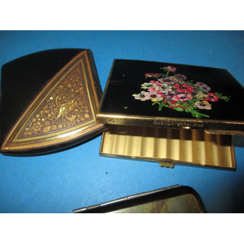 165 - A parcel of vintage cigarette cases, to include silver examples and one by Calibri, all in used cond... 