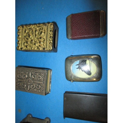 167 - A parcel of antique and later vesta cases, match box covers and go-to-beds, to include silver exampl... 