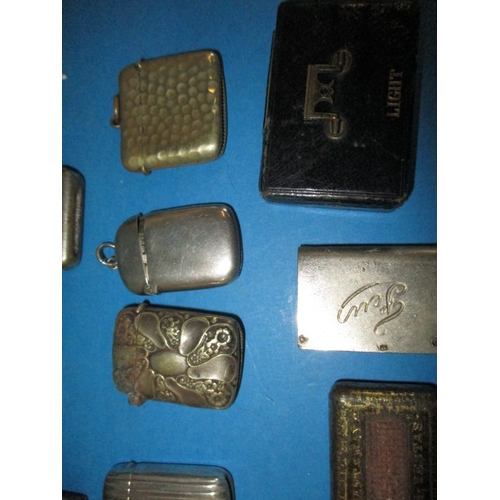 167 - A parcel of antique and later vesta cases, match box covers and go-to-beds, to include silver exampl... 