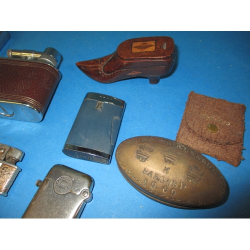 331 - A quantity of vintage smoking related items, to include snuff boxes, pipes and lighters, all in used... 