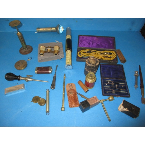 288 - A parcel of interesting collectables, to include postal scales optical devices and a drawing set, al... 