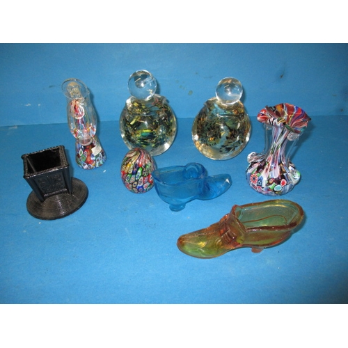 343 - A quantity of decorative glass items, to include hand-blown paperweights and moulded shoes, some wit... 