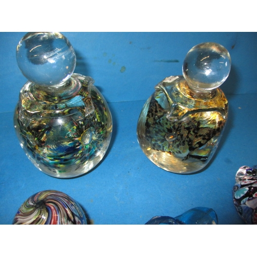 343 - A quantity of decorative glass items, to include hand-blown paperweights and moulded shoes, some wit... 